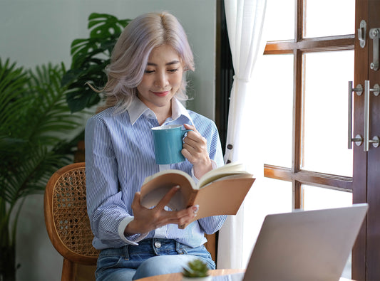 Nourished Self-care ideas, woman reading a book